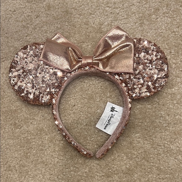 Disney Accessories - Disney Rose Gold Sequin Minnie Ear Headband with Bow